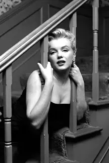 Prints of LOS ANGELES - MARCH 3: Movie star Marilyn Monroe hosts a press party held at her home on March 3, 1956 in Los Angeles, California. (Photo by Michael Ochs Archives/Getty Images) Marilyn Monroe: The Iconic Muse Prints: Press Party At Marilyn's