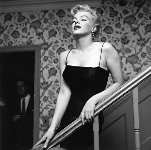 Prints of LOS ANGELES - MARCH 3: Movie star Marilyn Monroe hosts a press party held at her home on March 3, 1956 in Los Angeles, California. (Photo by Earl Leaf/Michael Ochs Archives/Getty Images) Marilyn Monroe: The Iconic Muse Prints: Press Party At Marilyn's