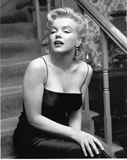 Prints of LOS ANGELES - MARCH 3: Movie star Marilyn Monroe hosts a press party held at her home on March 3, 1956 in Los Angeles, California. (Photo by Earl Leaf/Michael Ochs Archives/Getty Images) Marilyn Monroe: The Iconic Muse Prints: Press Party At Marilyn's