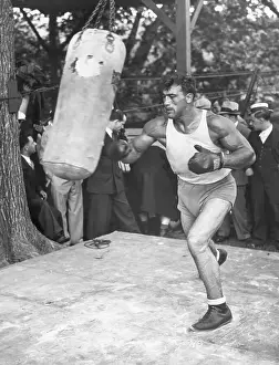 Tank Top Prints: Primo Carnera Hitting Punching Bag