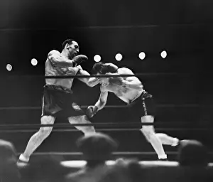 Primo Carnera Lands A Punch On Jack Shar