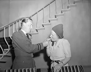 Bernhard Prints: Prince Bernhard Lighting Cigarette for Princess Juliana
