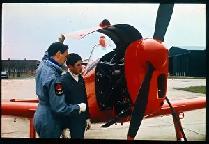 Charles Prints: Prince Charles Talking with Flight Instructor