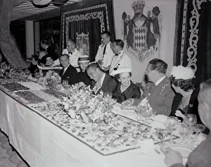 Prince Rainier and Grace Kelly Sitting With Colleagues