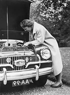 Princess Beatrix Inspecting a Car Engine