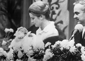 Princess Grace Holding Infant