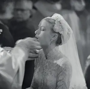 Princess Grace Receives Communion
