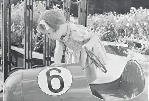 The Hague Prints: Princess Marijke Admiring Her Toy Car