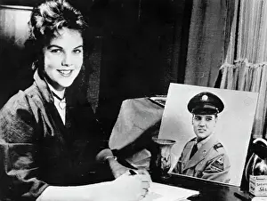 Wiesbaden Prints: Priscilla Beaulieu with Portrait of Elvis Presley