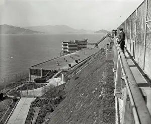 Alcatraz Prints: Prison Guard Standing and Gazing Outside Alcatraz