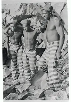 Prisoners in Uniform Working in The Elements