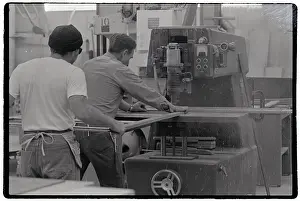 Prisoners Working With Machinery in Prison
