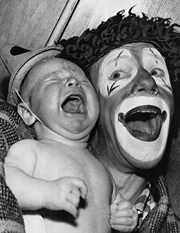 Professional Clown Whimsical Walker with His Infant Son Philip
