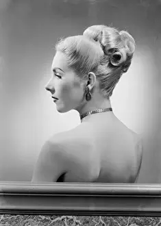 Beauty Concept Prints: Profile of elegant mid adult woman, studio shot