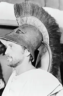 Profile of Kirk Douglas Wearing War Helmet