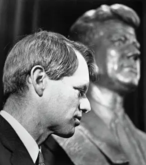 Profile of Robert F. Kennedy Next to Bust of John F. Kennedy