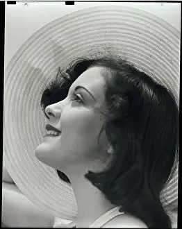 Sunbathing Prints: Profile of Woman Wearing Straw Hat