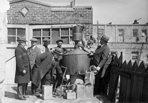 Fedora Prints: Prohibition Authorities with Captured Still in New York City