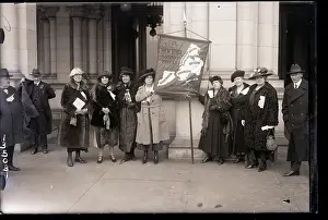 Prominent Women Holding a Banner