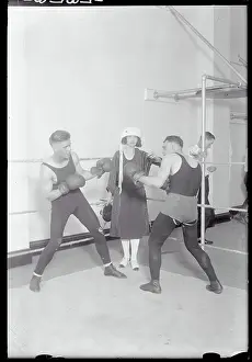 Promoter Florence North with Boxers on Ship Deck