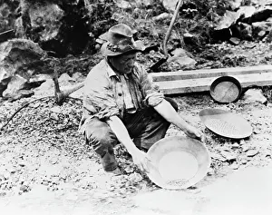 Squatting Prints: Prospector Panning for Gold in California