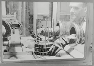 Protected Technician Working with Uranium