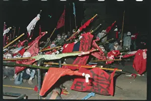 Protesters Carrying Cane Poles with Banners