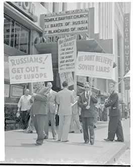 Protesters Carrying Picket Signs