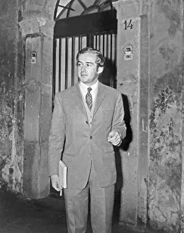Psychiatrist Andrea Dotti Standing at Doorway
