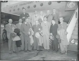 Publisher Prints: Publishers and Editors Posing near Airplane