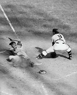 P.W.Reese Slides Safely On Home Plate