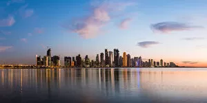 Persian Gulf Countries Gallery: Qatar, Doha. Cityscape at sunrise from the Corniche