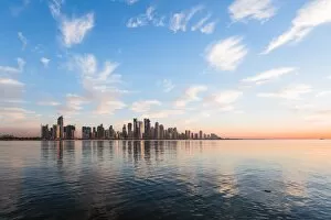 Persian Gulf Countries Gallery: Qatar, Doha. Skyline at sunrise from the Corniche