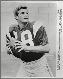 Quarterback Kay Stevenson Posing with Football