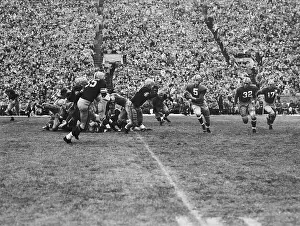 Quarterback Paul Hornung Running with Football