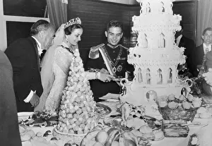 Queen Dina of Jordan Cutting Wedding Cake