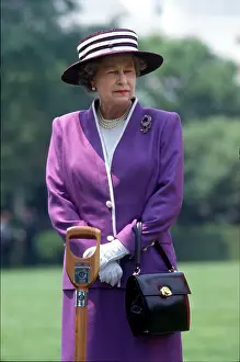 Queen Elizabeth II Attends A White House Tree Planting Ceremony