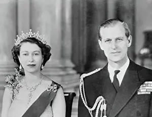 Queen Elizabeth II and Husband Duke of Edinburgh Posing in Royal Attire