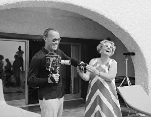 Bernhard Prints: Queen Juliana and Prince Bernhard with Cameras