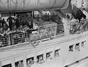 Queen Mary Carrying Troops Home