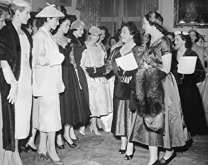 Queen Mother Elizabeth and Daughter Examining Models Clothing