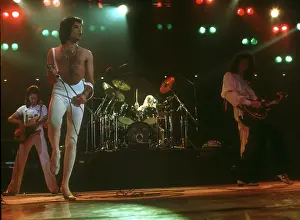 Prints of British rock band Queen perform in concert at the Forum on December 22, 1977 in Inglewood, California. (Photo by Richard Creamer/Michael Ochs Archives/Getty Images) Queen Unleashed: Queen Performing in LA