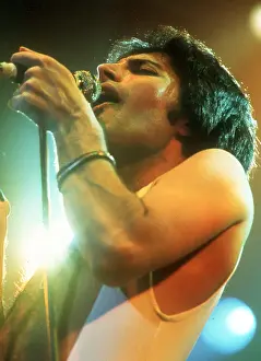 Prints of British rock band Queen perform in concert at the Forum on December 22, 1977 in Inglewood, California. (Photo by Richard Creamer/Michael Ochs Archives/Getty Images) Queen Unleashed: Queen Performing in LA