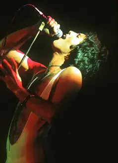 Prints of British rock band Queen perform in concert at the Forum on December 22, 1977 in Inglewood, California. (Photo by Richard Creamer/Michael Ochs Archives/Getty Images) Queen Unleashed: Queen Performing in LA