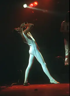 Prints of British rock band Queen perform in concert at the Forum on December 22, 1977 in Inglewood, California. (Photo by Richard Creamer/Michael Ochs Archives/Getty Images) Queen Unleashed: Queen Performing in LA