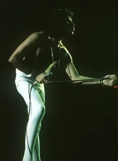 Prints of British rock band Queen perform in concert at the Forum on December 22, 1977 in Inglewood, California. (Photo by Richard Creamer/Michael Ochs Archives/Getty Images) Queen Unleashed: Queen Performing in LA