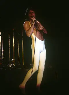 Prints of British rock band Queen perform in concert at the Forum on December 22, 1977 in Inglewood, California. (Photo by Richard Creamer/Michael Ochs Archives/Getty Images) Queen Unleashed: Queen Performing in LA
