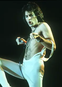 Prints of British rock band Queen perform in concert at the Forum on December 22, 1977 in Inglewood, California. (Photo by Richard Creamer/Michael Ochs Archives/Getty Images) Queen Unleashed: Queen Performing in LA