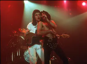 Prints of British rock band Queen perform in concert with Freddie Mercury wearing black leotard at the Forum on December 22, 1977 in Inglewood, California Queen Unleashed: Queen Performing in LA