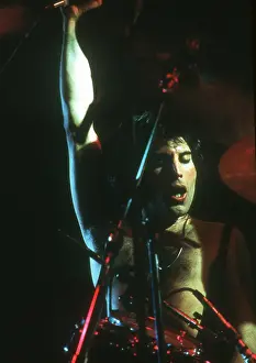 Prints of British rock band Queen perform in concert with Freddie Mercury wearing black leotard at the Forum on December 22, 1977 in Inglewood, California Queen Unleashed: Queen Performing in LA